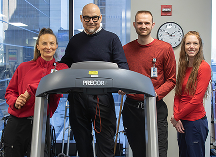 Ernest Magallan with rehab team