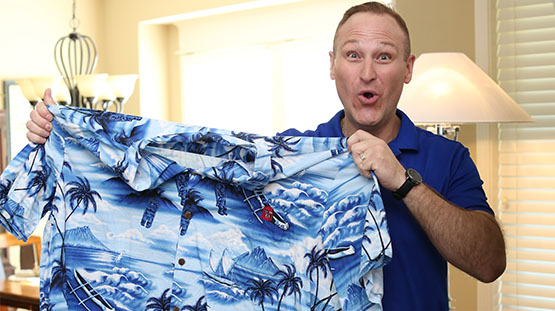 Brian Wilson pogging over the fact that his old shirt is so much larger than he needs to wear now