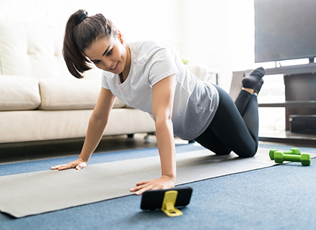 Woman exercising at home